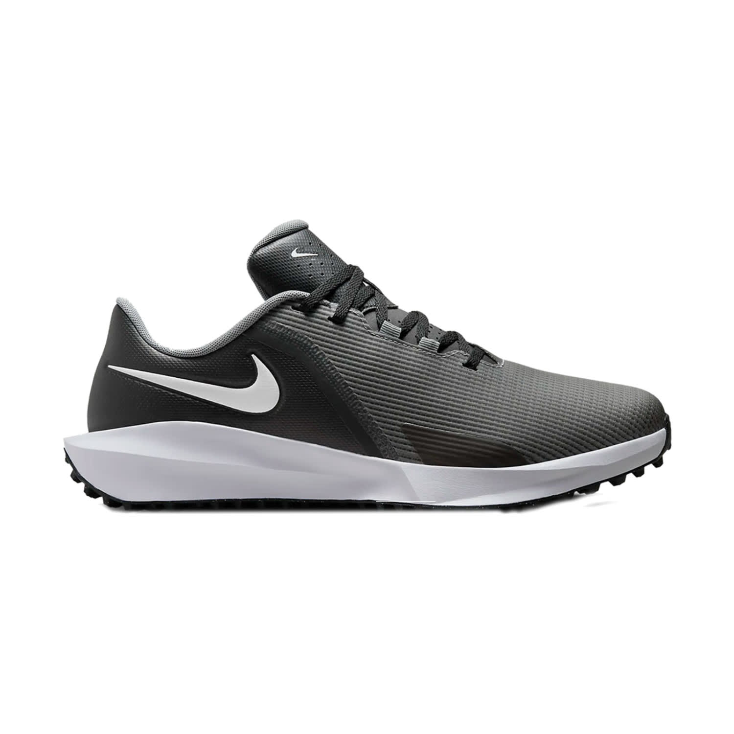 Black and white nike golf shoe with textured upper material.