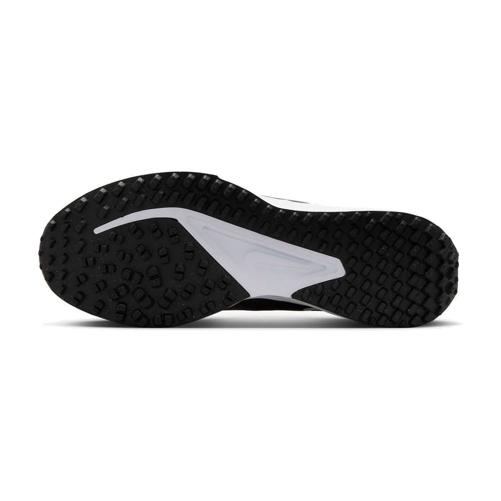 Black and white nike running shoe with textured sole design.