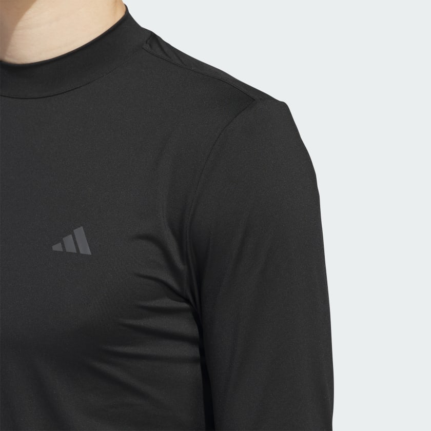 Black adidas long-sleeve athletic shirt with small logo on chest.