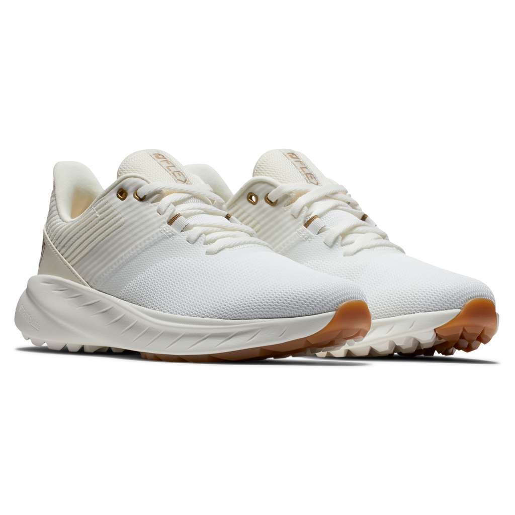 White golf shoe with gum sole and gold accents, nike air zoom model.