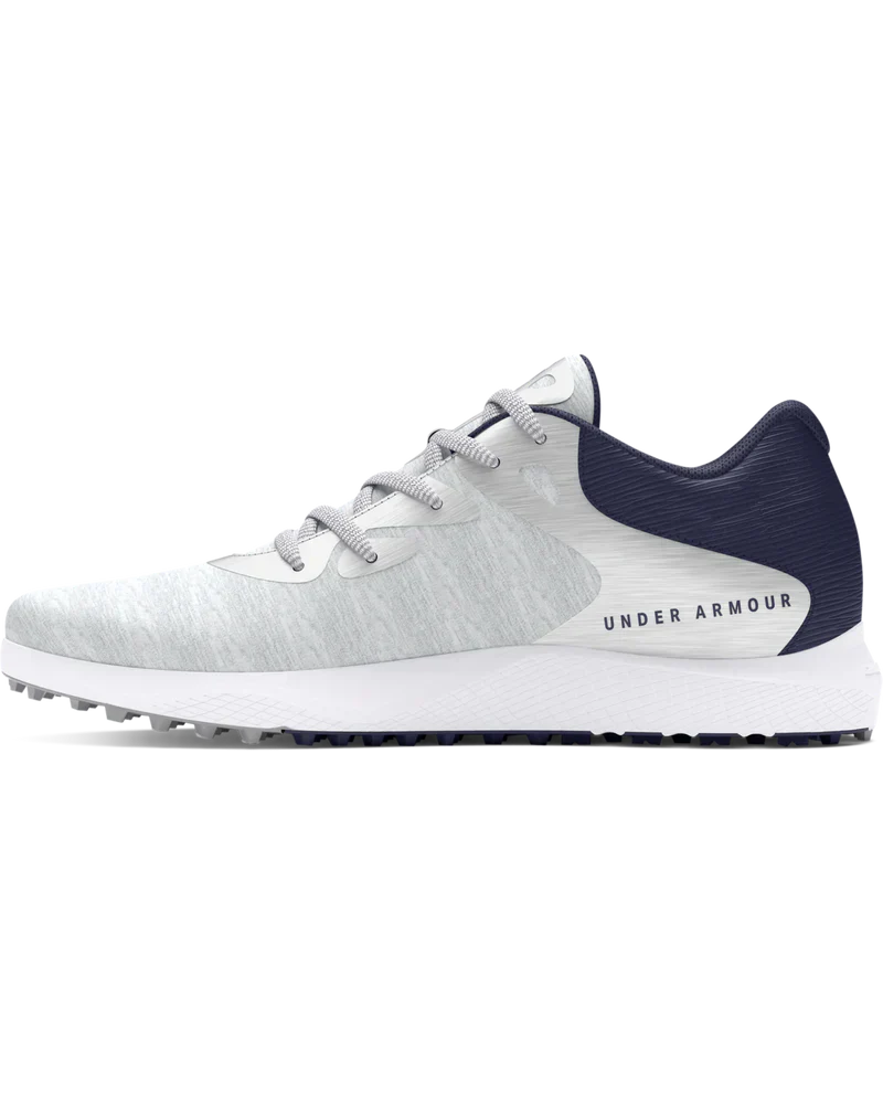 Under armour white and navy blue golf spikeless shoe.